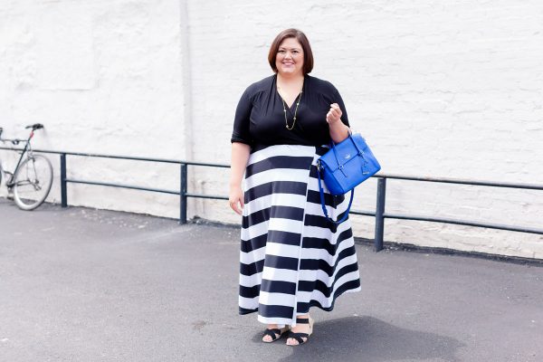 Plus size fashion blogger Authentically Emmie in a Rebdolls dress