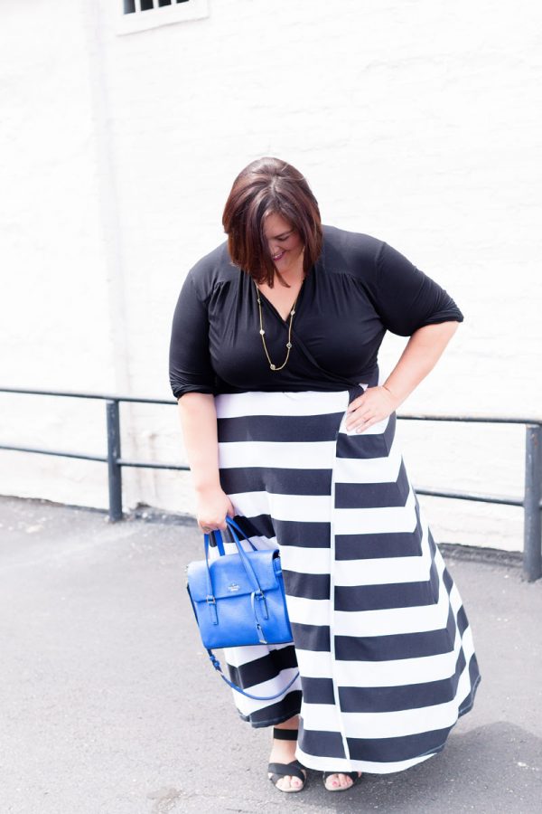 Plus size fashion blogger Authentically Emmie in a Rebdolls dress