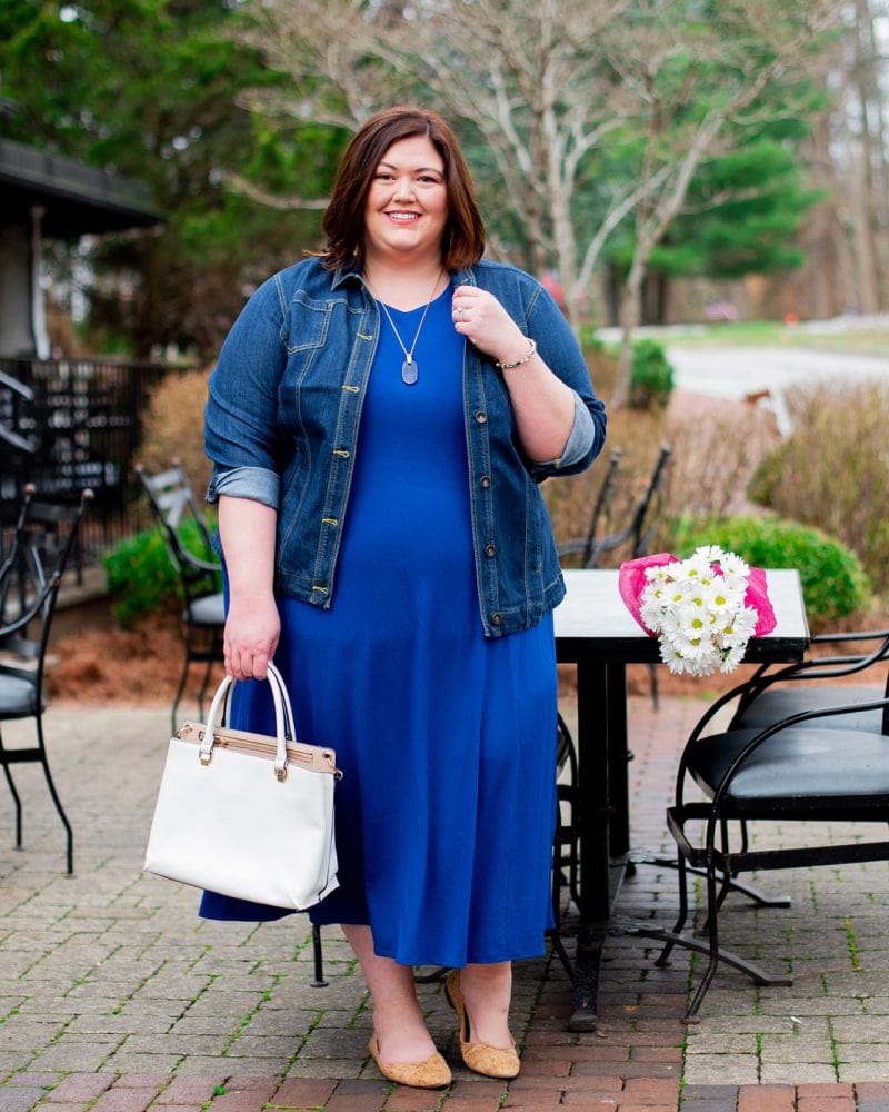 A blue maxi dress and denim jacket on plus size fashion influencer Authenticallly Emmie
