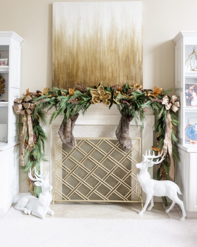 Holiday Home Tour 2020 18 Pine, cedar, and magnolia fireplace mantle garland