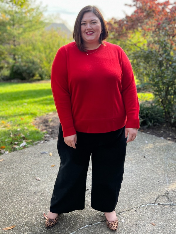 Plus Size Fashion Blogger Authentically Emmie in Red Cashmere Sweater and Wide Leg Black Pants from Universal Standard